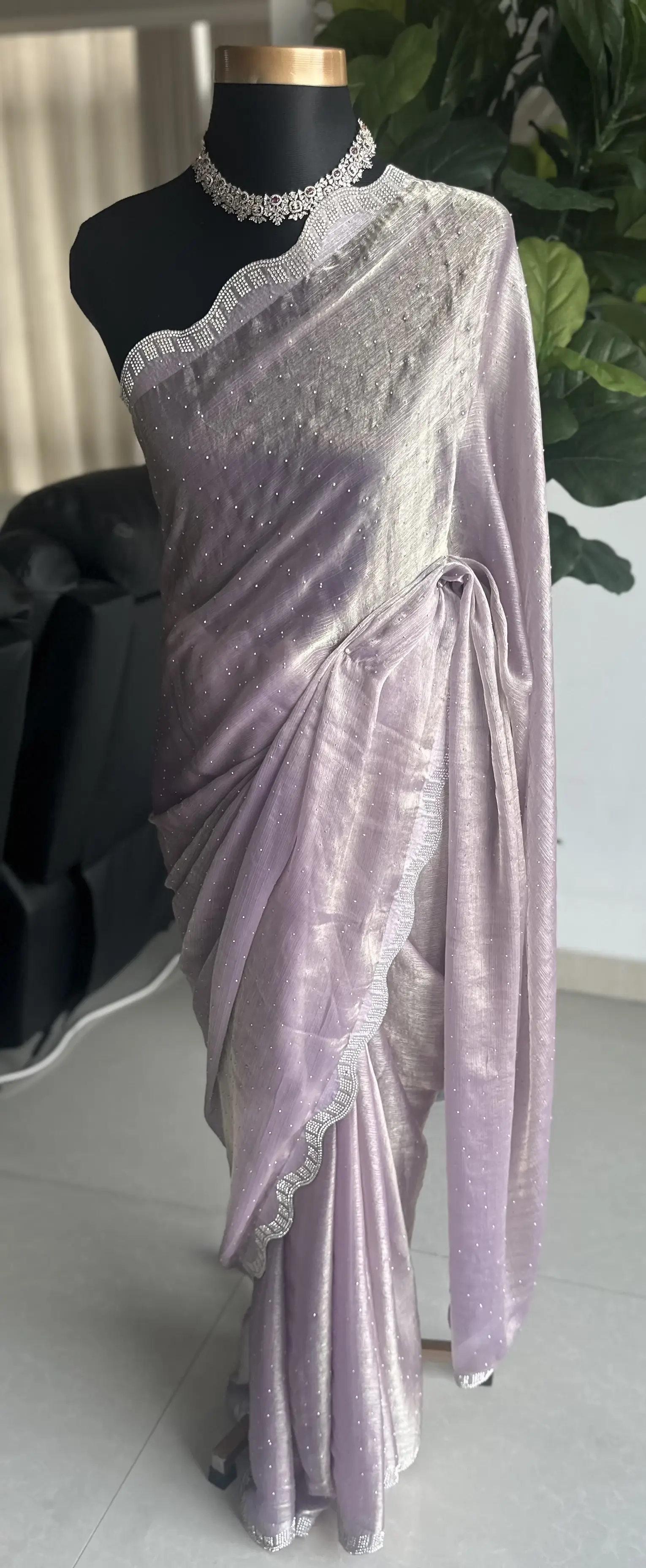 Light purple shimmery party saree with Swarovski stonework