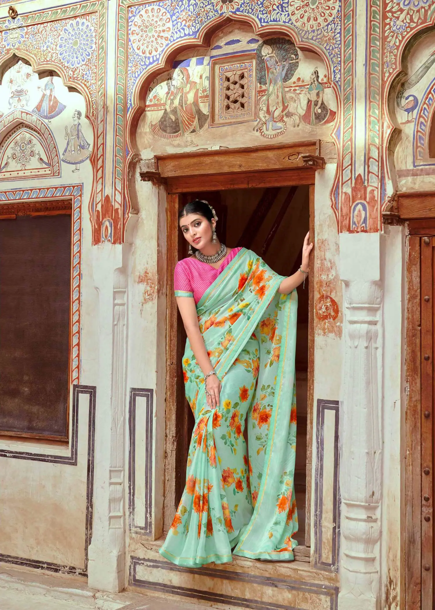 Sea green floral printed Zari saree
