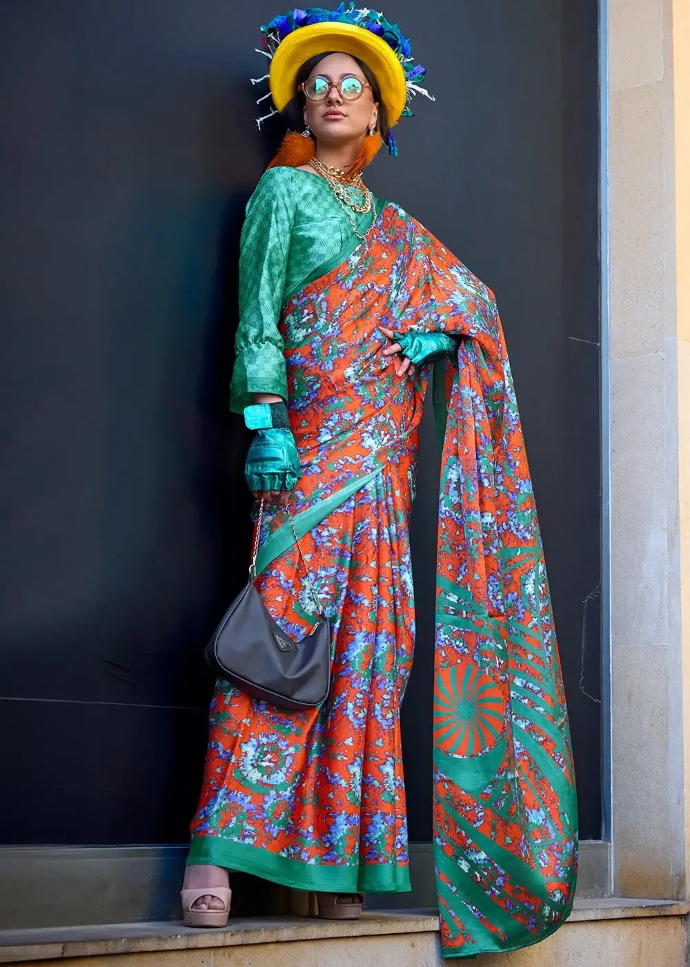 Orange & green contemporary printed satin crepe saree