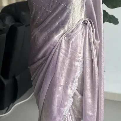 Light purple shimmery party saree with Swarovski stonework