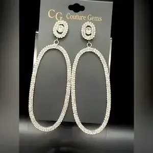 Long oval pave drop earrings with cubic stones