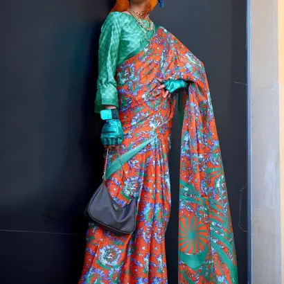 Orange & green contemporary printed satin crepe saree