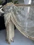 Cream chantilly lace saree with intricate gold border