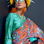 Orange & green contemporary printed satin crepe saree