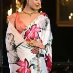 White satin crepe silk saree with floral pattern