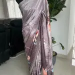 Grey floral printed saree with stonework.